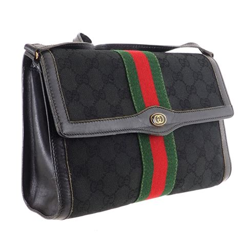 vintage black gucci monogram|vintage Gucci clutch bags.